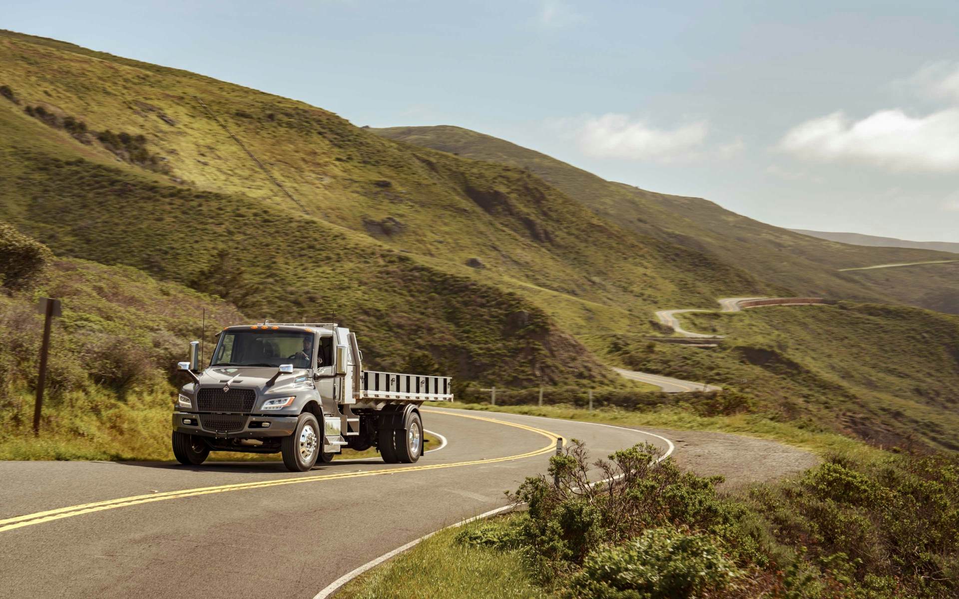 A truck driving on a winding road