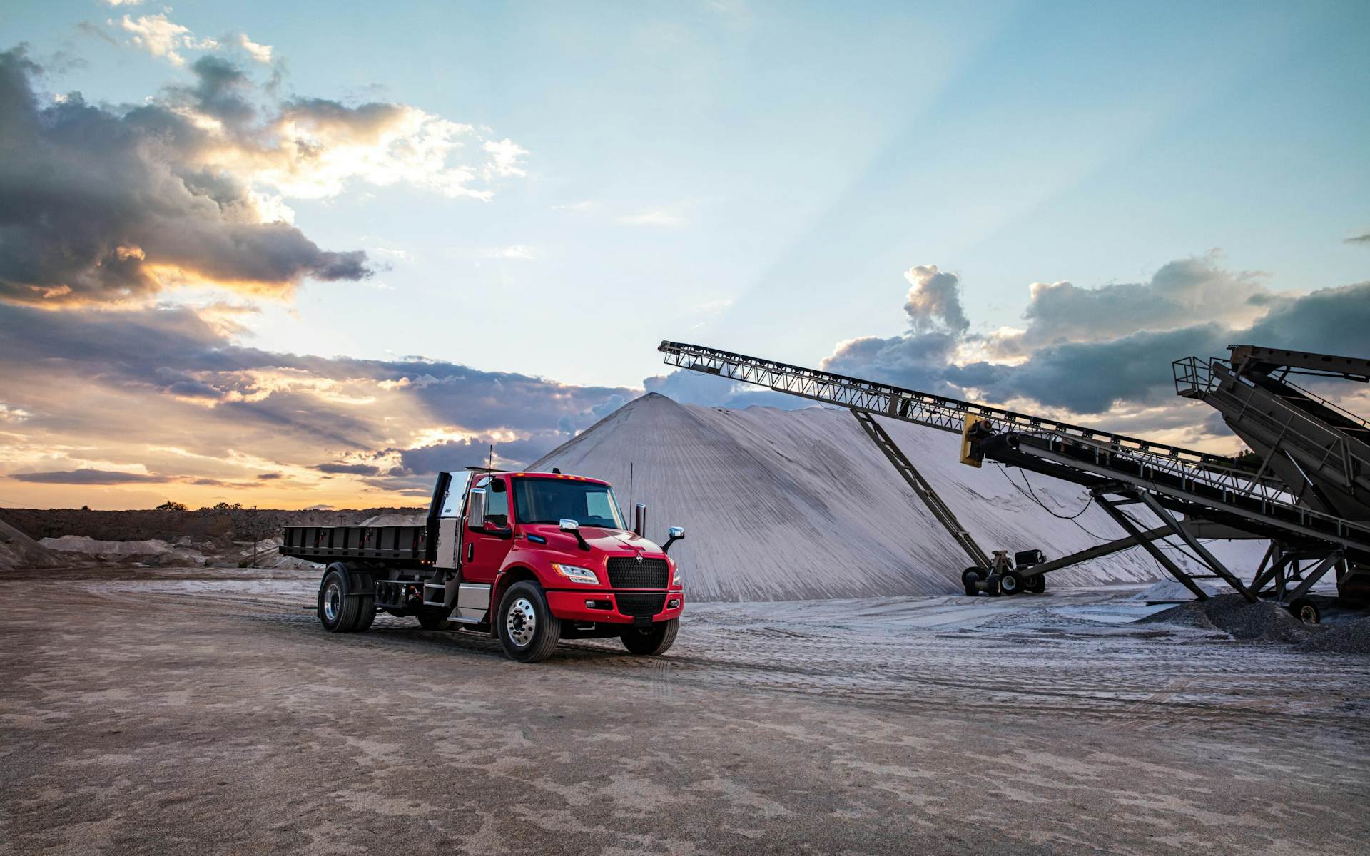A truck in a dirt field