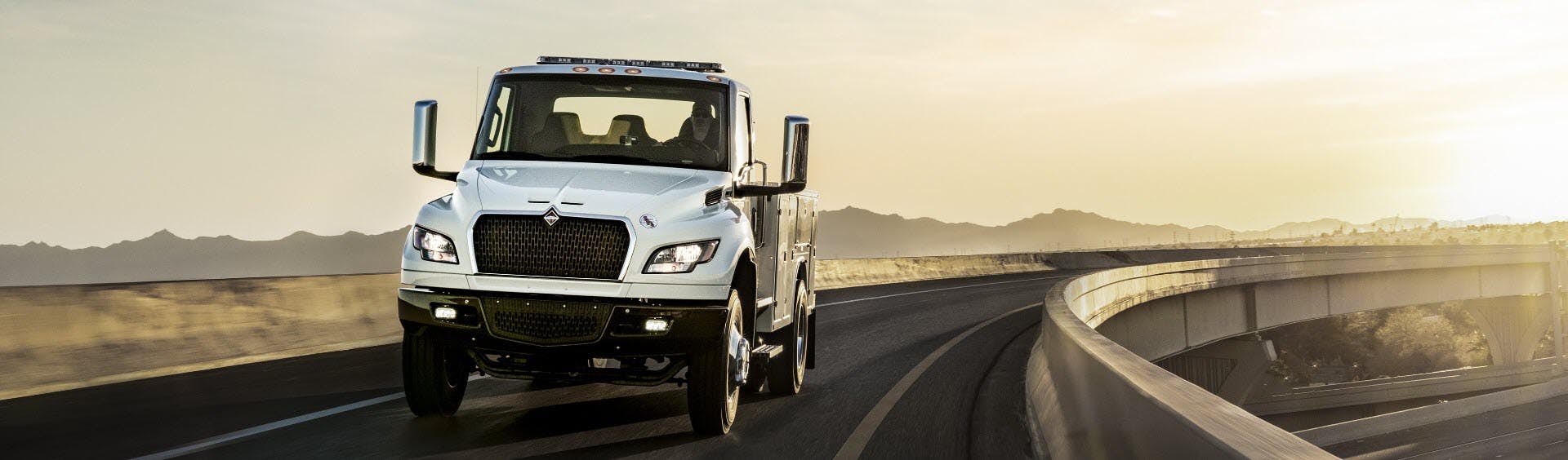 International truck driving on bridge